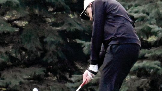 Trojans finish Battle Creek meet as runner-ups