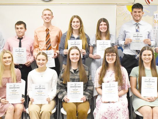 Cedar Catholic inducts new members