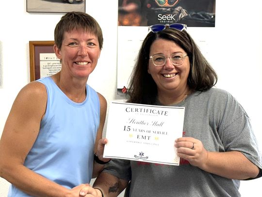 Hall earns service certificate