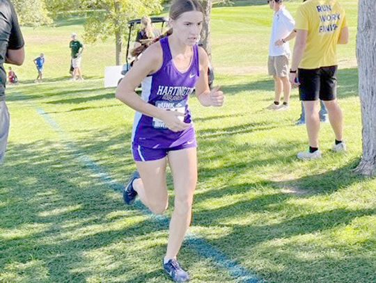 Lady Wildcats hoist the hardware at Battle Creek meet