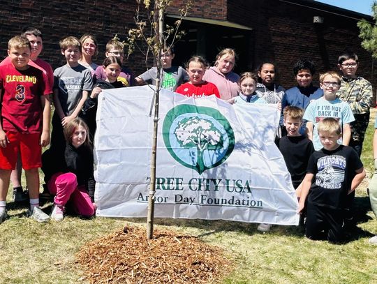 Local fourth graders dig into hands-on Arbor Day lesson