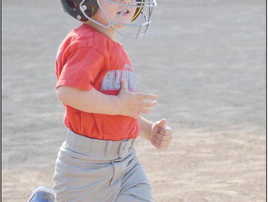 	Oliver Thelen rounds the bases during a game last week 