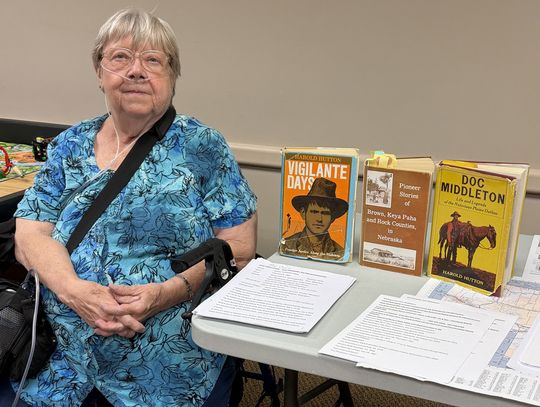 Randolph Woman’s Club collects food pantry donations, hears outlaw presentation