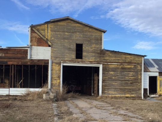 The book closes on the Laurel lumber yard