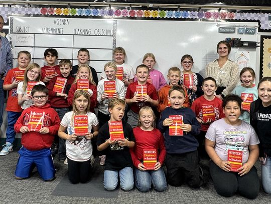 Third-graders receive dictionaries