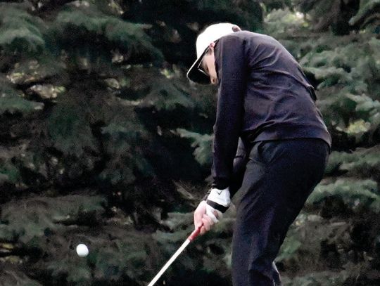 Trojans finish Battle Creek meet as runner-ups