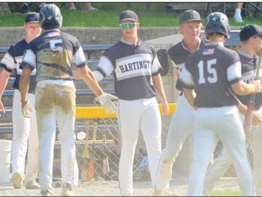 Tyan Baller (5) celebrates with his Hartington American Legion Senior 