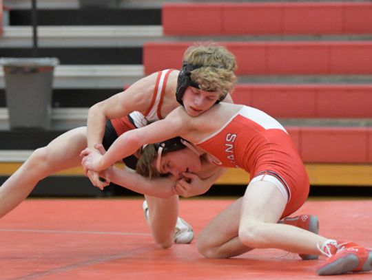 Wrestlers get back to work after long weather delay