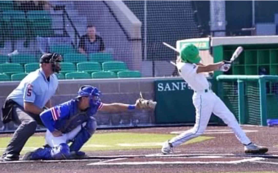 Behind the plate