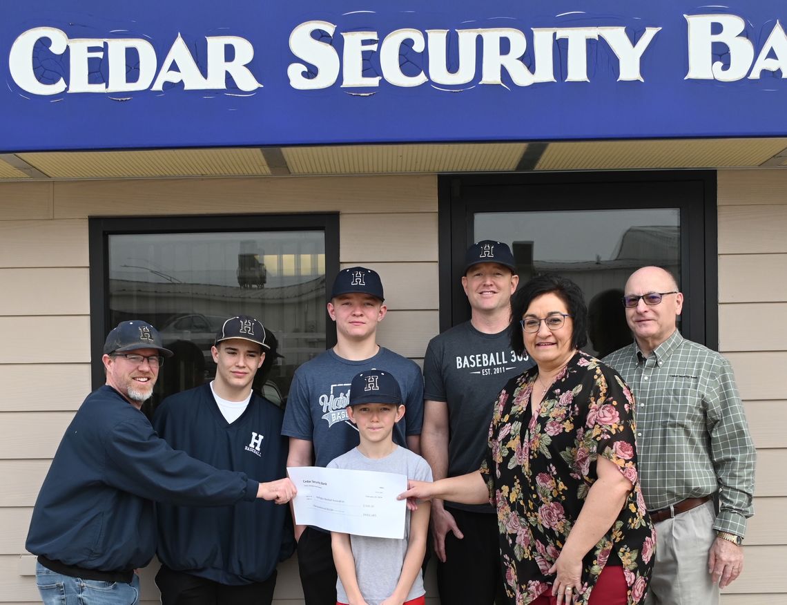 Local bank helps to update outdated seating at Felber Park Baseball Field