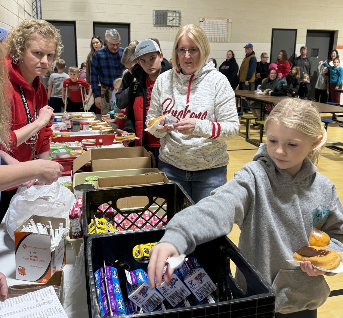 Megan Shearer helps serve