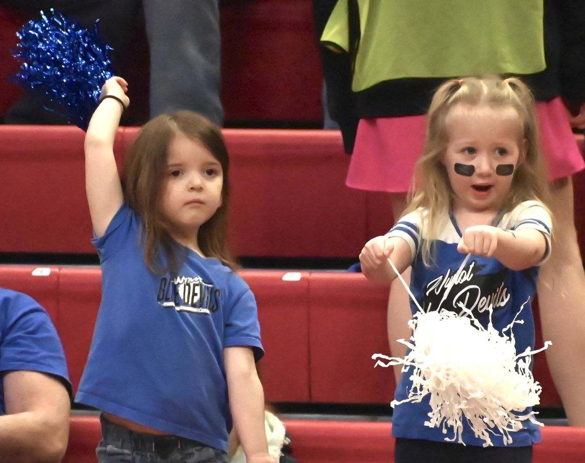 Wynot fans Sloane Lenzen and Brooklyn Wieseler cheer