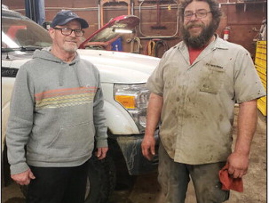 Doug Stevens and Kerry Steffen represent the transition that recently took place with Stevens selling his longtime auto repair business to Farmers Union Cooperative Gas &amp; Oil of Hartington. Mark Mahoney | Cedar County News