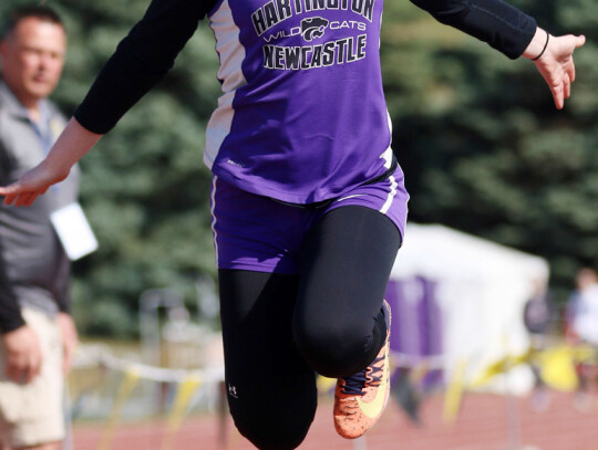 Hartington-Newcastle’s Jade Ford makes her state track debut in the triple jump last week at Omaha Burke Stadium. She posted a 319.5 inches to finish 24th on the day.