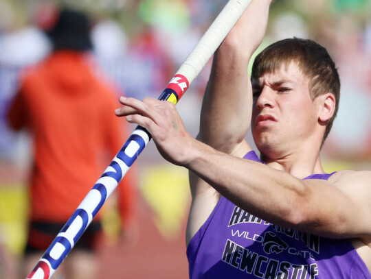 Hartington-Newcastle senior Lane Heimes prepares for his pole vault attempt. Heimes cleared the bar at 12-0 to finish 12th at the State meet.