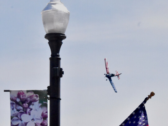 Carly Christensen performed a fly-over in his patriotic plane in the finale of the dedication ceremonies.