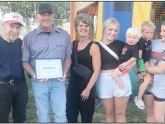 Jim Scott (second from left) received the Good Neighbor Award. He’s pictured with his father, LaVern “Scotty,” his wife, Stacey, daughter, Ella, grandsons, Bodey and Riley, and daughter, Sydney.