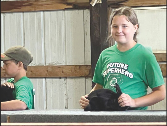 Anna Lipp shows off her award-winning rabbit.