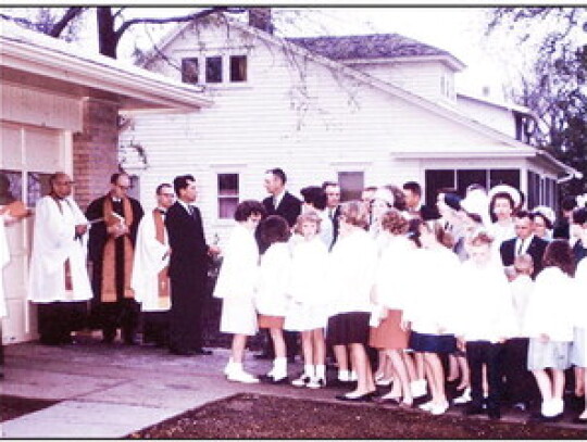 The congregation gathered again for another ceremony in 1963 to dedicate the new parsonage.