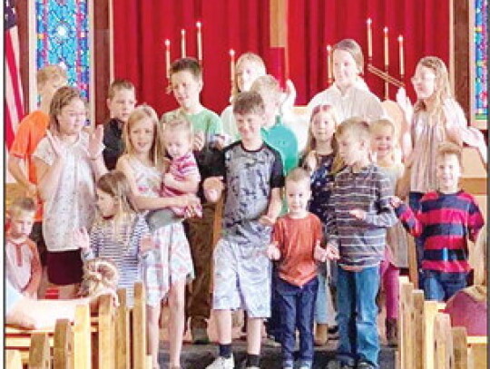 Music has always been a vital part of the services and social life surrounding Trinity Lutheran Church. This 2022 photo shows the children’s choir performing at a church service.