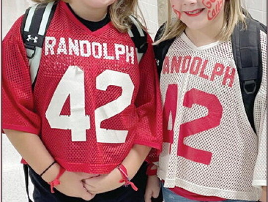 Fifth-grader Braelyn Brockman and her sister, thirdgrader Blakeley, show off their Cardinal spirit as part of the Red and White dress-up day at Randolph Elementary, part of Homecoming festivities. Jackie Loberg | Randolph Times