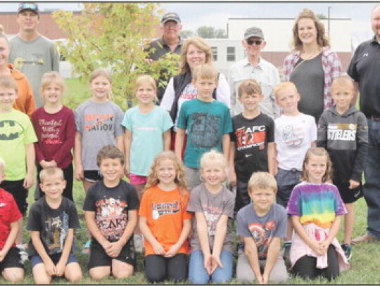 Those taking part in the Arbor Day celebration were: (back) Chris Wood-Nebraska Forest Service; Michael Mainz-Laurel Tree Board; Dwayne Freeman-Laurel Tree Board; Keri Hart-LCC Elementary Principal;DanKuhlman-LaurelEconomicDevelopmentCoordinator;(thirdrow