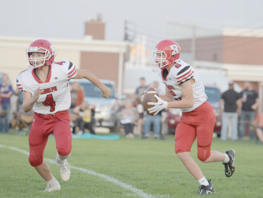 Milo Rayford (right) runs the ball as Owen Junck blocks in JV action against Osmond Friday. The varsity squad had a bye week to regroup for the final push this season. Jeri Schmit | Randolph Times