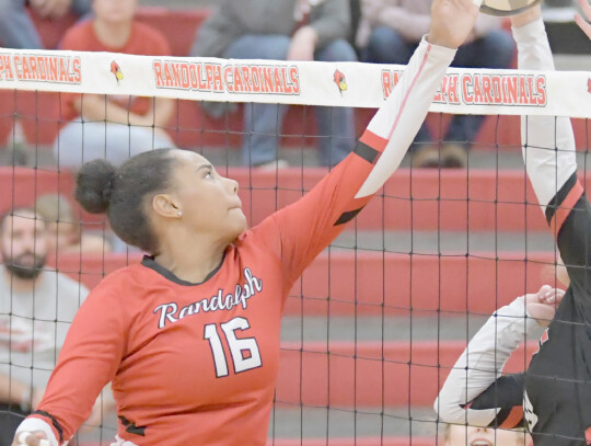 Randolph’s Mabel Ngebeh puts a dink down over the net against Creighton in volleyball action last week. The Lady Cardinals fell 3-0 (25-23, 25-13, 2520) on Randolph’s Parents Night. Jeri Schmit | Randolph Times