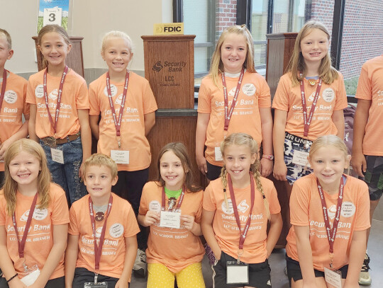 LCC fourth-grade student tellers are: (back row) Mason Wiebelhaus, Brooke Hansen, Evie Specht, Adelaide Clegg, Hadley Nordby, Darian Boysen, (front row) Hannah Detlefsen, Cooper Detlefsen, Isabella Lawyer, Lola McKamy and Myrtie McCorkindale.