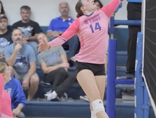 Wynot’s Kayla Pinkelman goes up to tip the ball over the net during Monday night SubDistrict action. The Lady Devils earned the sweep to advance to Tuesday’s title game.