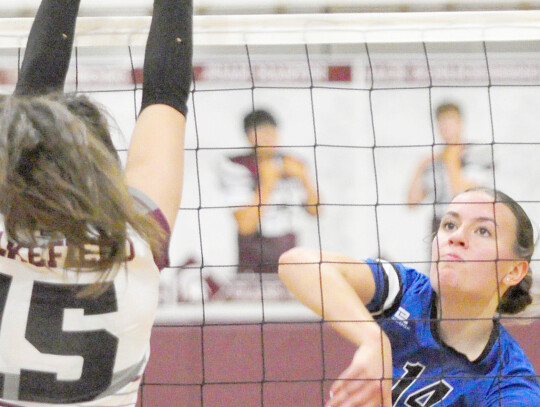 Wynot’s Kayla Pinkelman fires the ball into the Wakefield defense during triangular action at Wakefield. Pinkelman’s strong hitting helped the Lady Devils earn a spot in this week’s Class D2 State Volleyball Tournament in Lincoln.