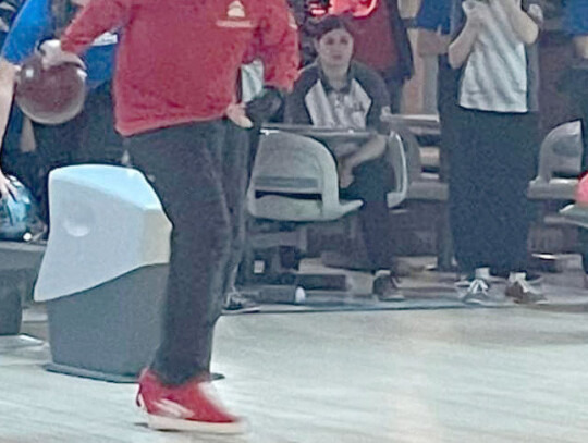 Chase Junck, Randolph’s Unified Bowling team captain, places the ball down the middle of the lane during the team’s first competition - a triangular in Wayne.