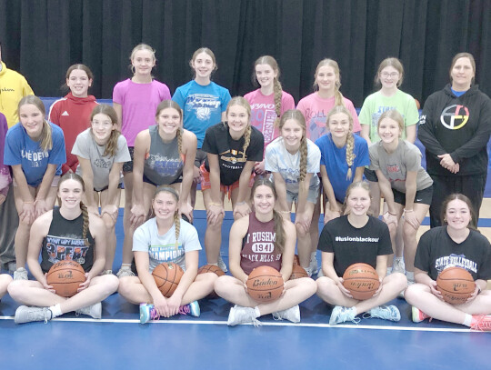 Members of the 2023-24 Wynot Lady Blue Devil girls basketball team include: (back row) Coach Steve Wieseler, Student Manager Layla Lenzen, Student Manager Mya Pinkelman, Taylor Pinkelman, Haley Wieseler, Jordan Foxhoven, Emily Walter, Coach Tina Foxhoven,