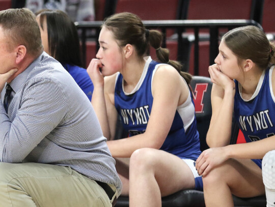 Wynot’s Kenna Oligmueller (above) battles for the ball with an Overton player during Saturday night’s Class D2 State title game at the Pinnacle Bank Arena in Lincoln. Wynot got off to an early lead but couldn’t hold off Overton, and had to settle fo