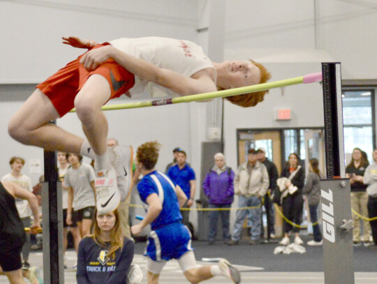 Randolph senior Ella Scott (top) gets ready to hurl the shot put during an indoor meet last week. Scott placed 51st March 19 at the 2024 Dan Lennon Invite, held at the University of South Dakota, with a throw of 7.91 meters, and 30th at the Mount Marty In