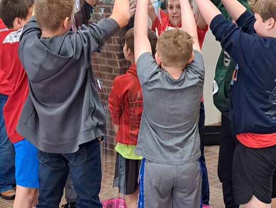 Bubbleology is a favorite lesson for many students attending AquaFest, especially being enclosed in a giant bubble like these Randolph students: Corby Robinson, Eli Miller, Carson Schulz, Reece Lienemann, Adam Miller, Mason Beal, and Jace Brodersen (in th